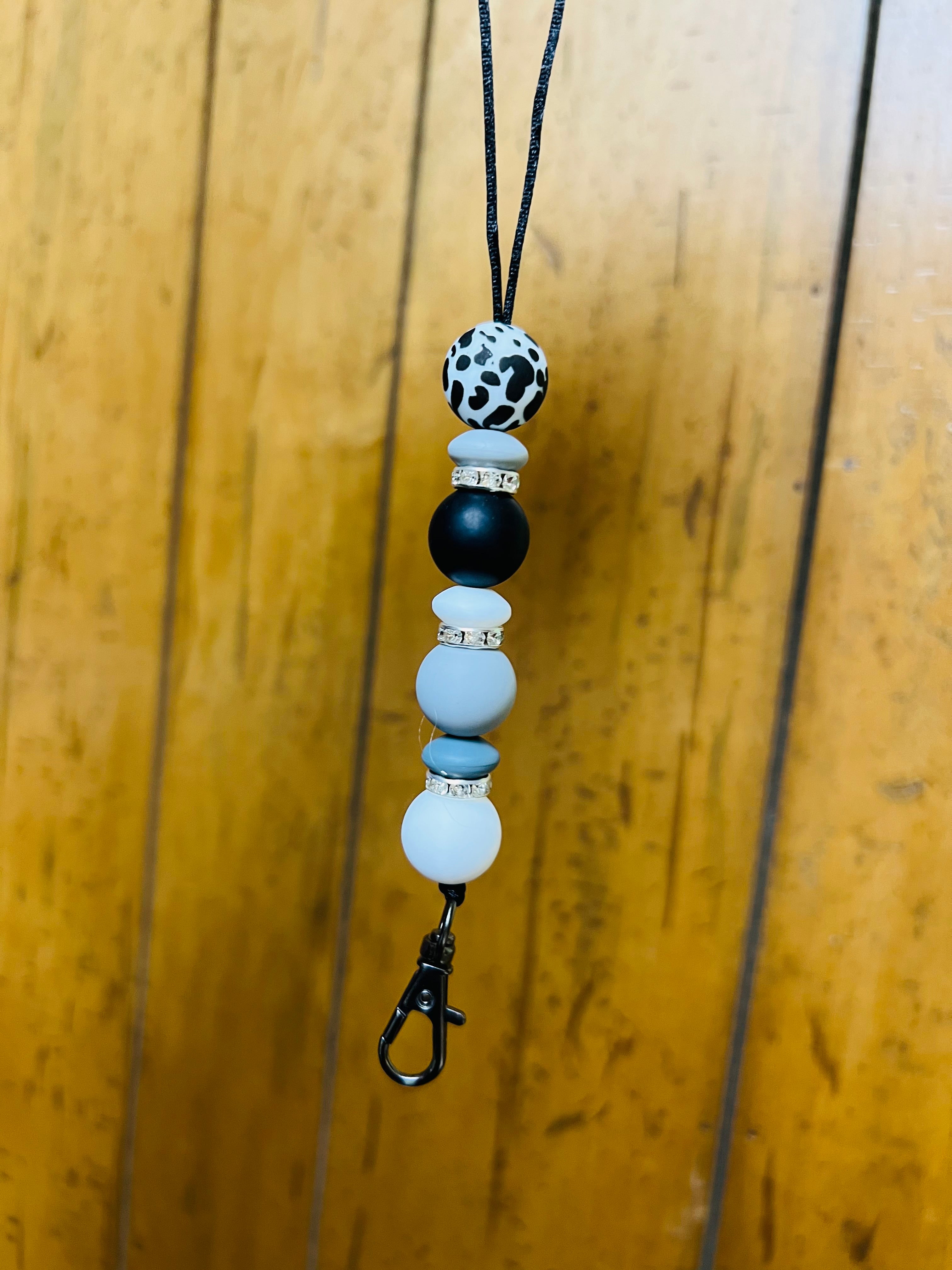 Grey cow print car hanger