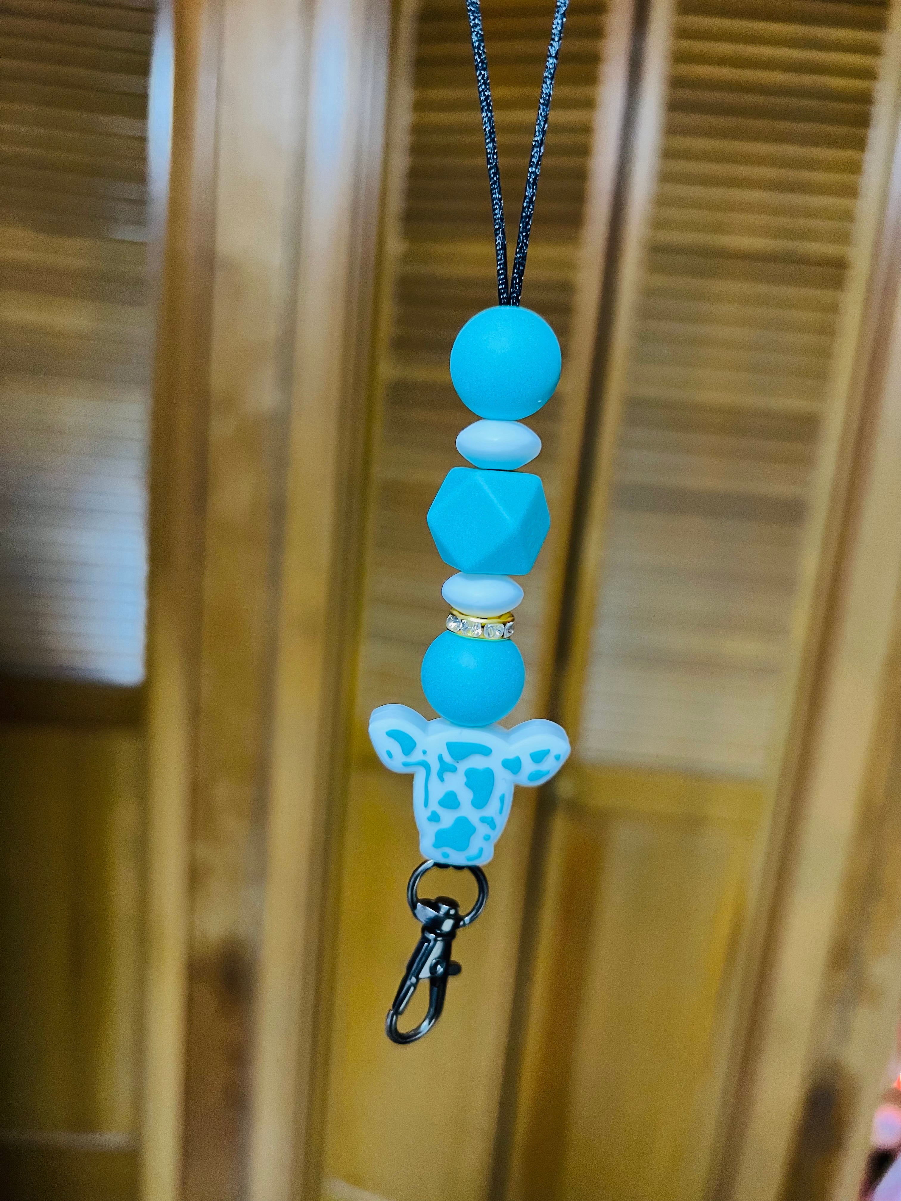 Teal cow car hanger