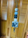 Grey cow car hanger